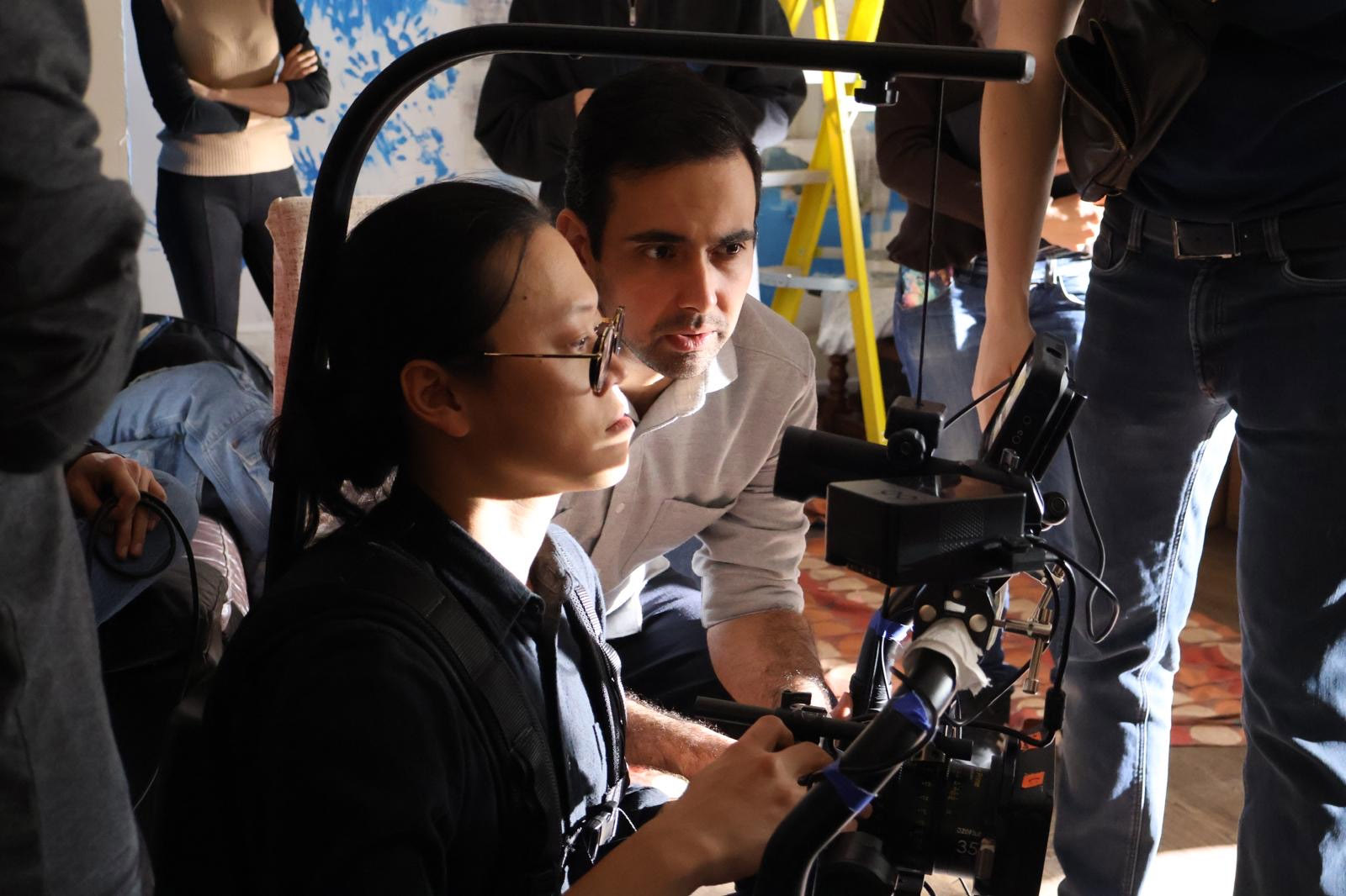 LFA BLOG_Alumni success_Amir distribution_On set looking into a camera